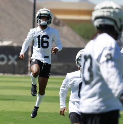 Raiders wide receiver Jakobi Meyers (16) warms up during an NFL football practice at the Inter ...