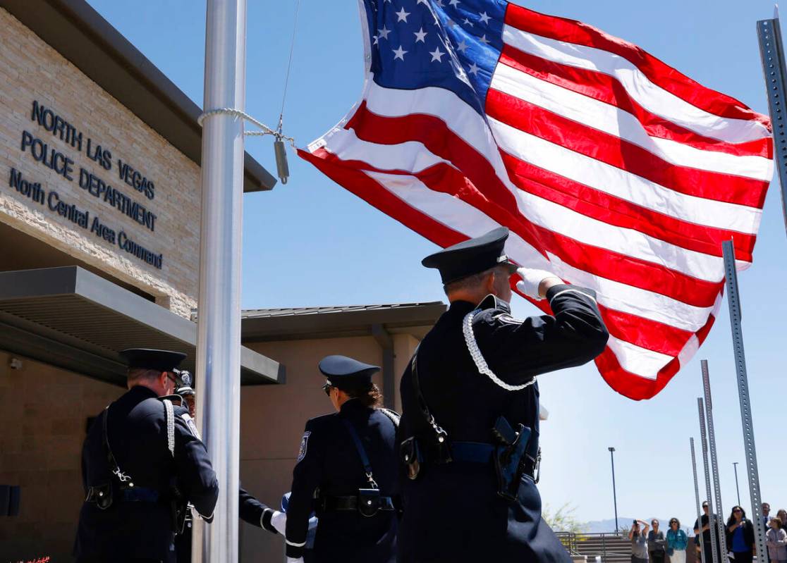 An American flag is raised during the official opening ceremony and ribbon cutting for the comm ...