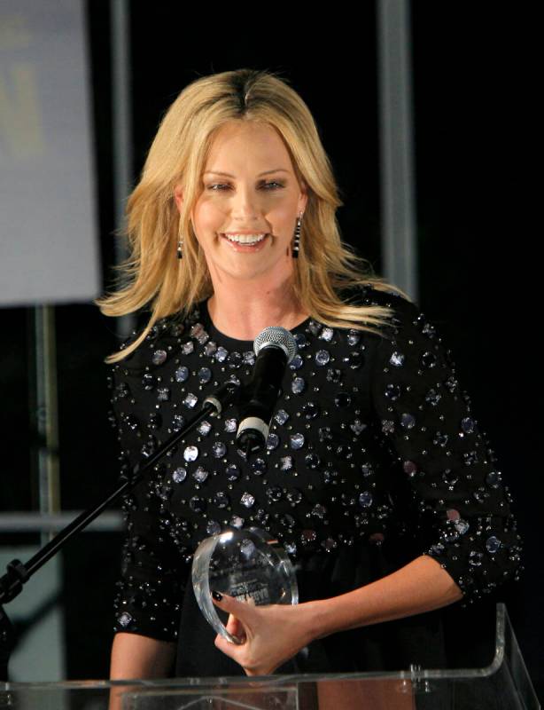 Actress Charlize Theron accepts the Half-Life Award at the CineVegas film festival award ceremo ...