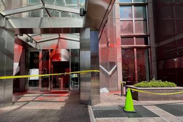 Red paint covers portions of the entrance to the German consulate building, Wednesday, June 12, ...