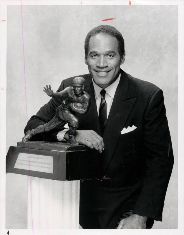 File - OJ Simpson with his Heisman trophy. December 2, 1991. (Las Vegas Review-Journal)