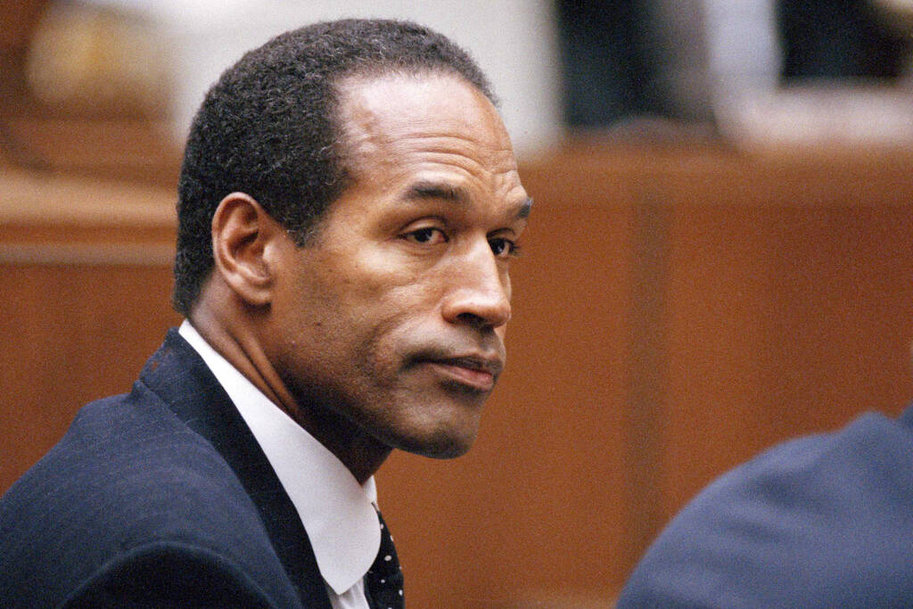 FILE - O.J. Simpson at Superior Court in Los Angeles on July 22, 1994. (AP Photo/Pool/Lois Ber ...