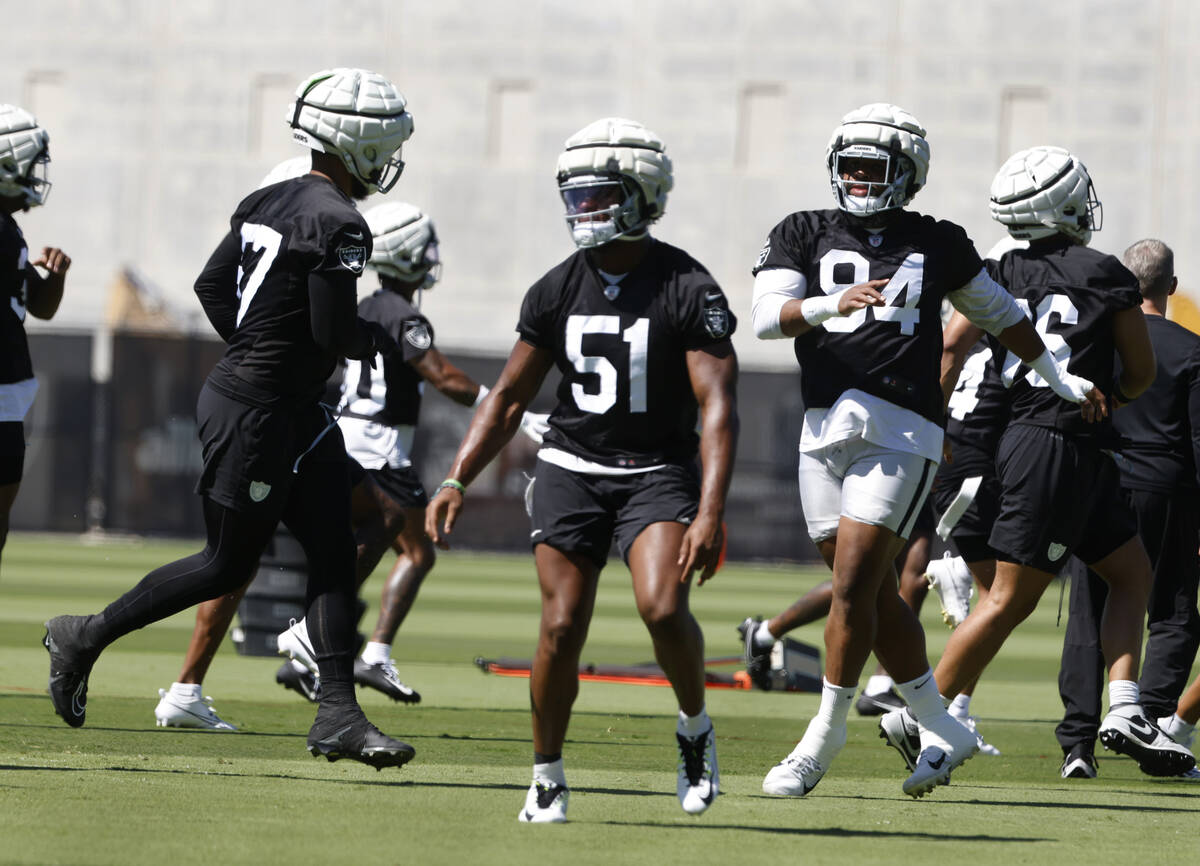 Raiders safety Tre'von Moehrig (7) defensive end Malcolm Koonce (51) and defensive tackle Chris ...