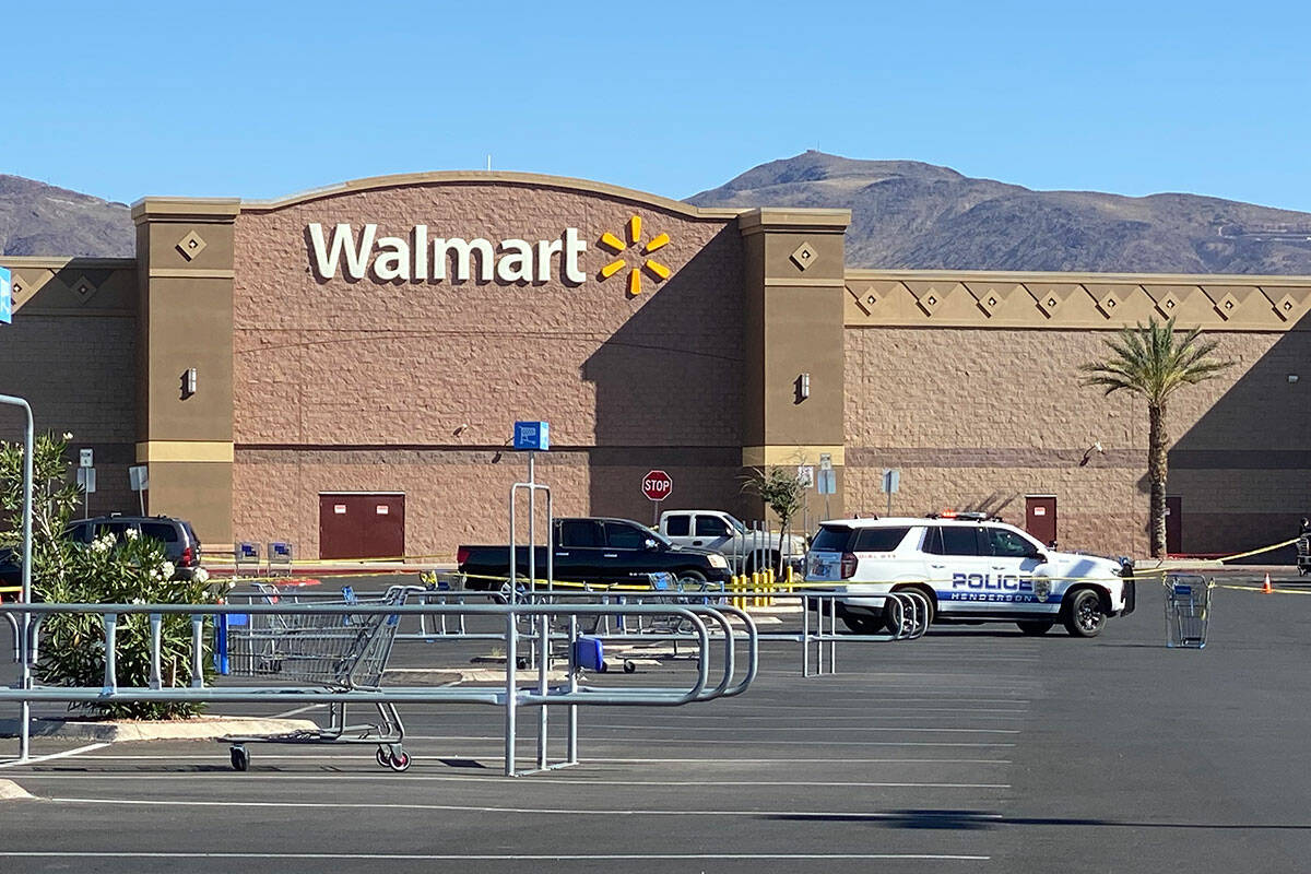 The Henderson Police Department blocks off the entrance to a Walmart in the 500 block of Marks ...