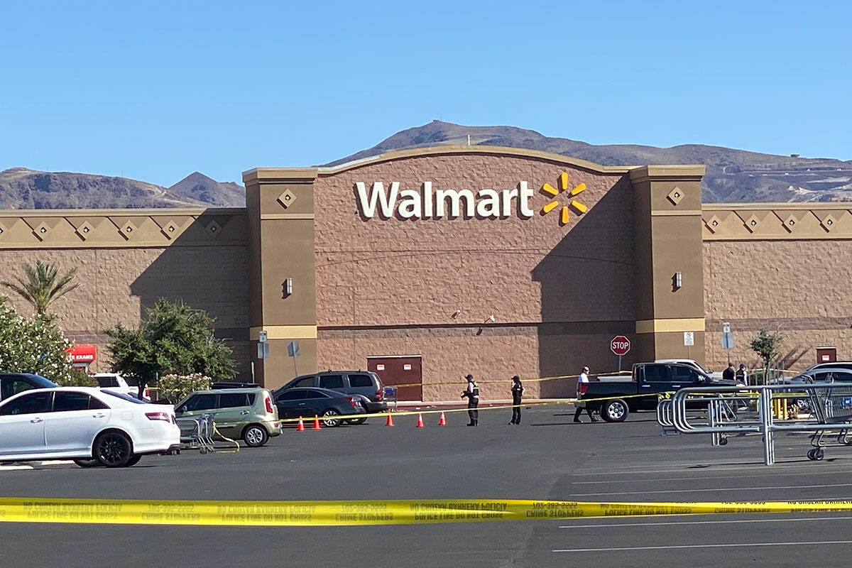 A man was shot and died inside a vehicle in the Walmart parking lot at Eastgate Plaza. The Hen ...