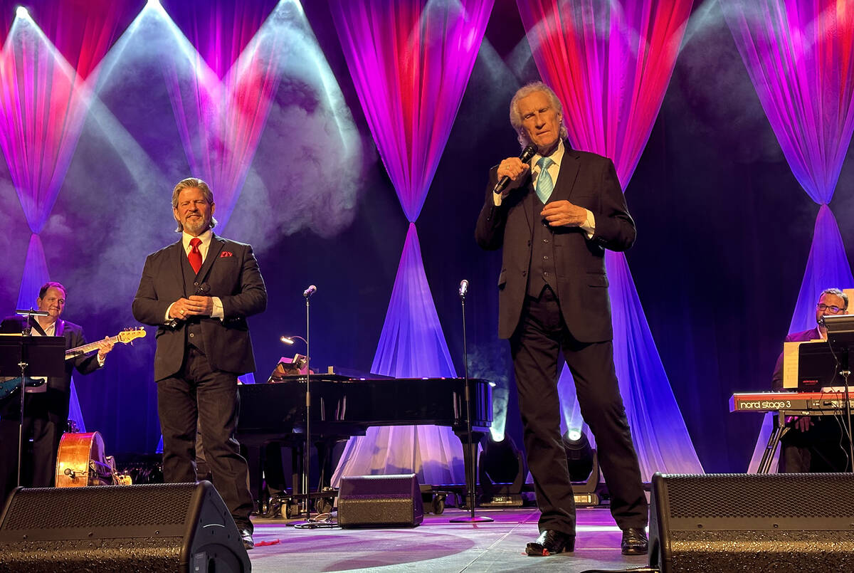Bucky Heard and Bill Medley of the Righteous Brothers perform during a wedding vow-renewal cere ...
