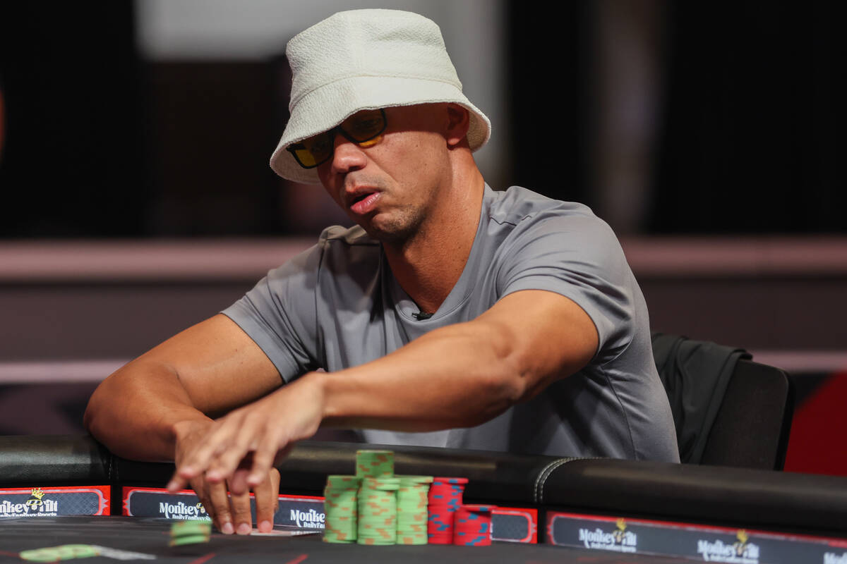 Phil Ivey competes during the final table of the $10,000 buy-in Limit 2-7 Triple Draw Champions ...