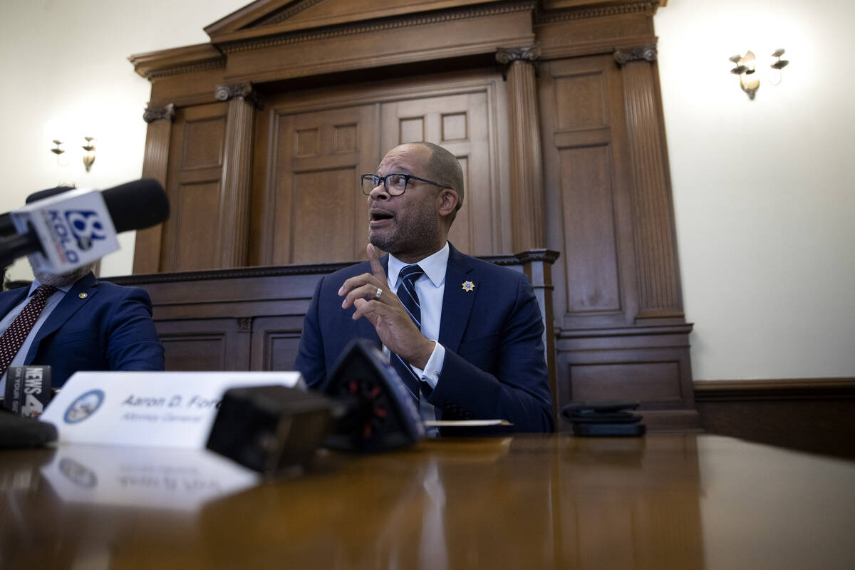 Nevada Attorney General Aaron Ford answers questions during a news conference at the Nevada Sta ...