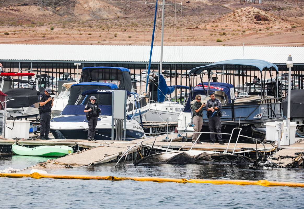 Officials at the scene where a fire sank 10 boats, did damage to several more and caused minor ...