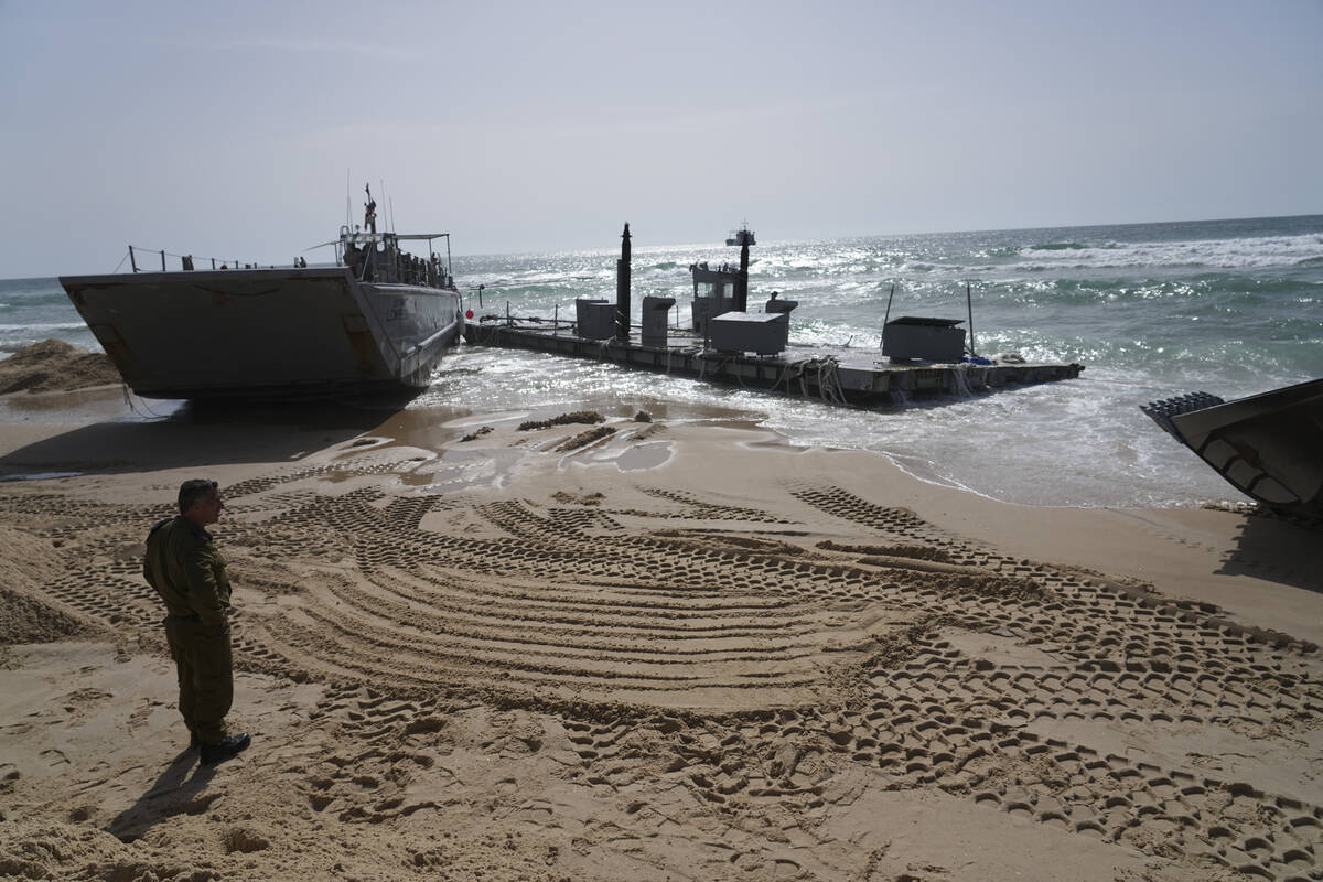 FILE - A U.S. Army landing craft is seen beached in Ashdod, May 26, 2024, after being swept by ...