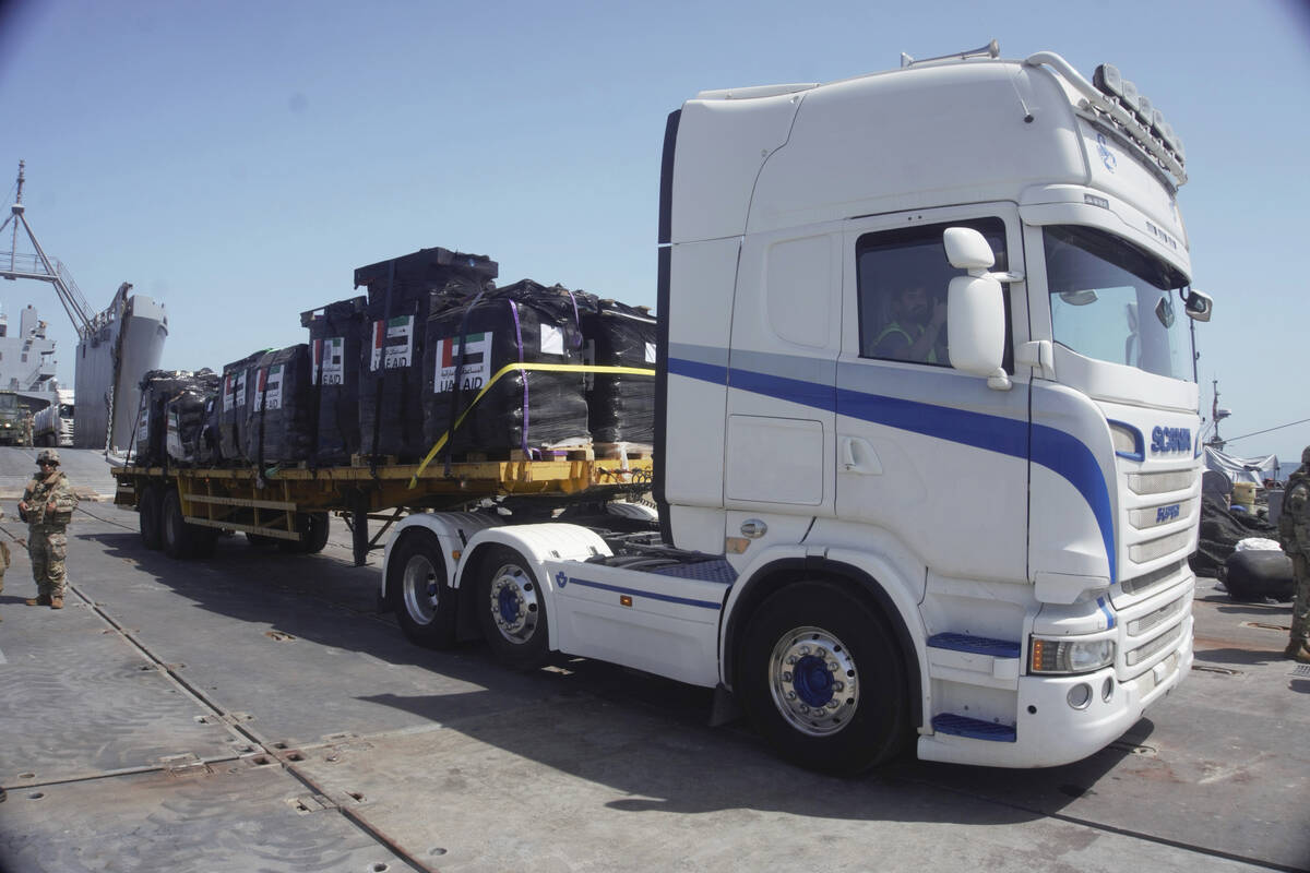 In this photo provided by U.S. Central Command, humanitarian aid arrives in Gaza, Saturday, Jun ...