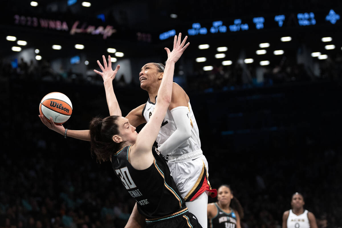 Las Vegas Aces forward A'ja Wilson (22) shoots against New York Liberty forward Breanna Stewart ...