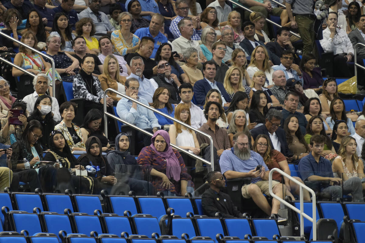 Parents and guests arrive at Pauley Pavilion at UCLA for the commencement ceremony on Friday, J ...