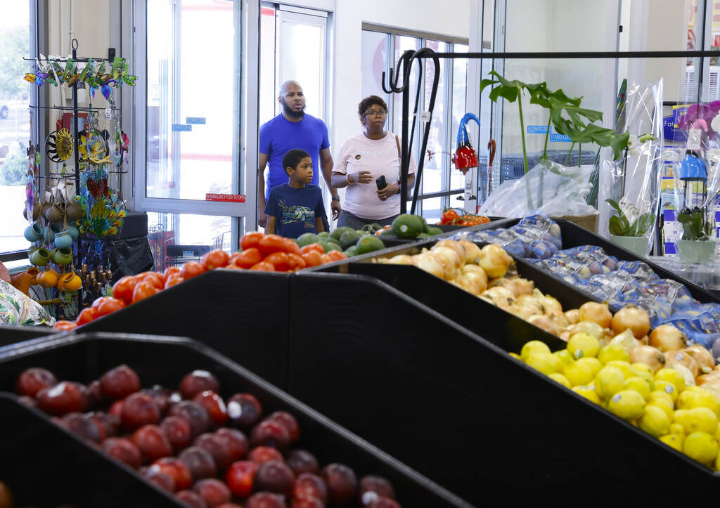 Shoppers enter Grocery Outlet Bargain Market, on Wednesday, June 19, 2024, in Las Vegas. (Bizua ...