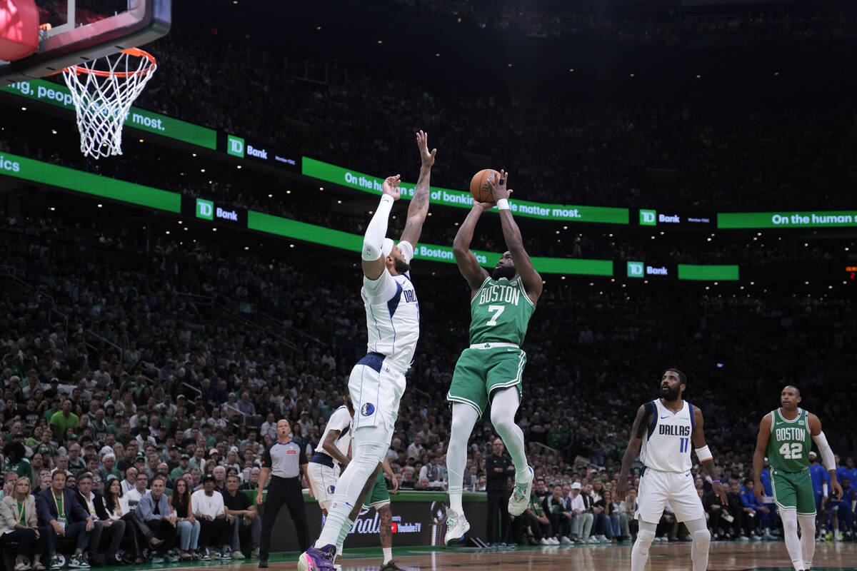 Boston Celtics guard Jaylen Brown (7) shoots during Game 5 of the NBA Finals basketball series, ...