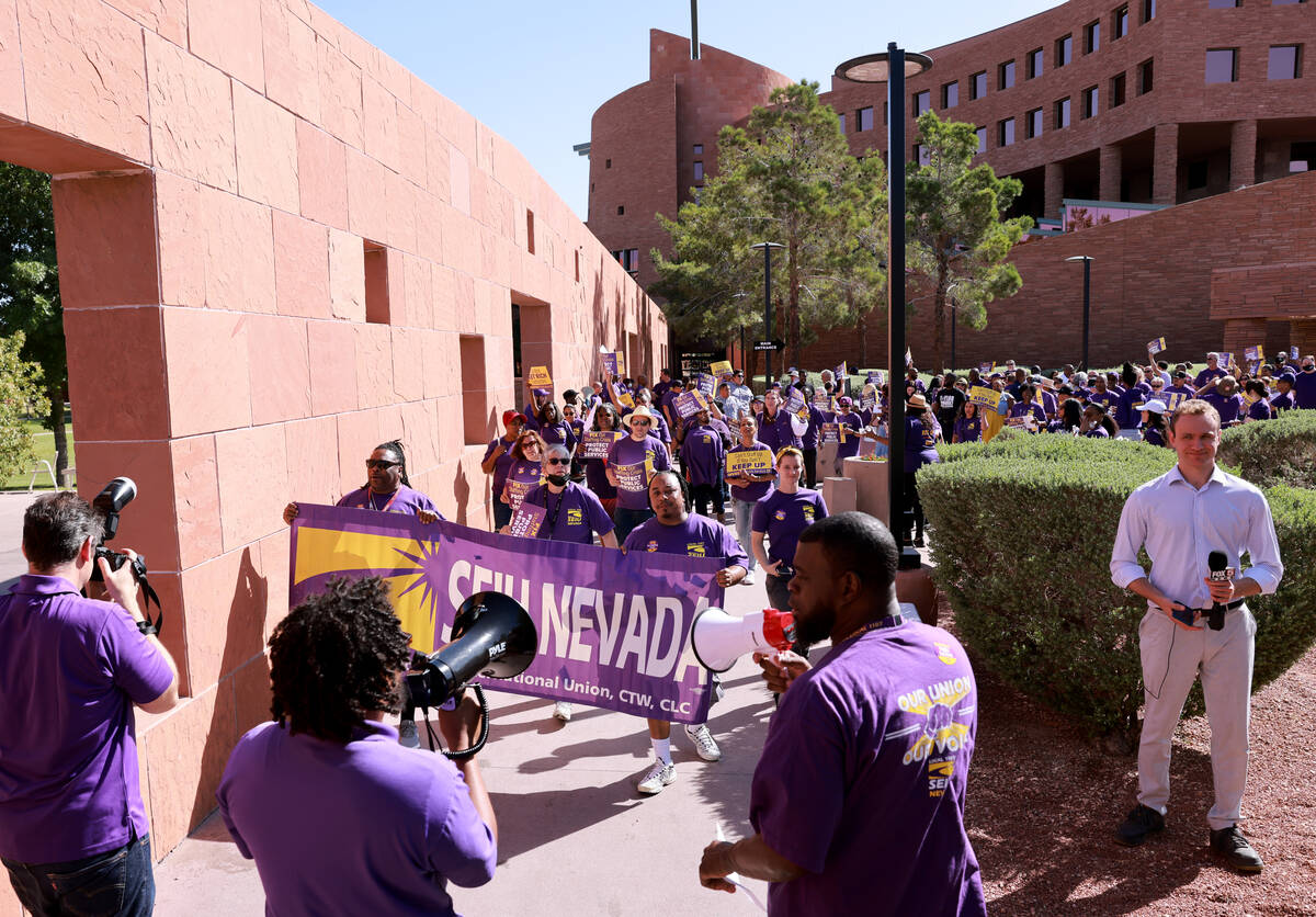 Clark County employees rally outside the Clark County Government Center in Las Vegas Tuesday, J ...