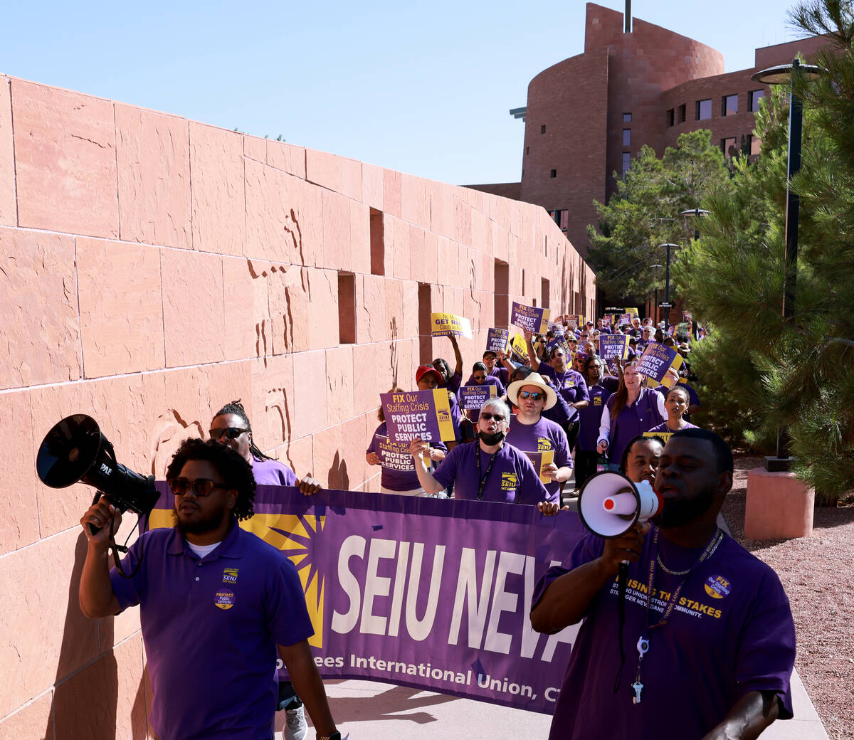 Clark County employees rally outside the Clark County Government Center in Las Vegas Tuesday, J ...