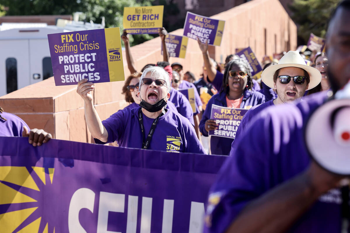 Clark County employees rally outside the Clark County Government Center in Las Vegas Tuesday, J ...