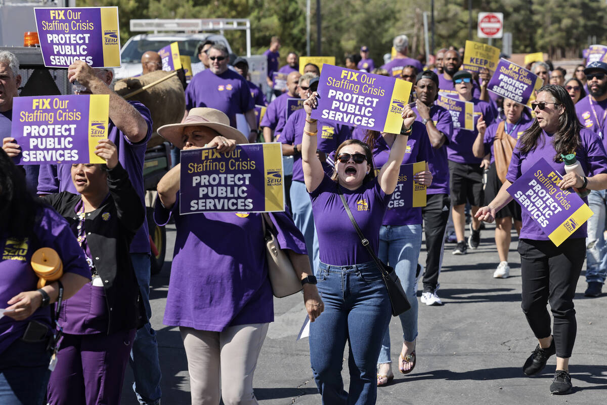 Clark County employees rally outside the Clark County Government Center in Las Vegas Tuesday, J ...