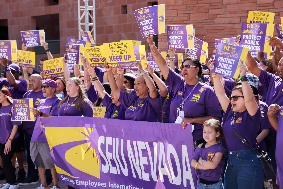 Clark County employees rally outside the Clark County Government Center in Las Vegas Tuesday, J ...