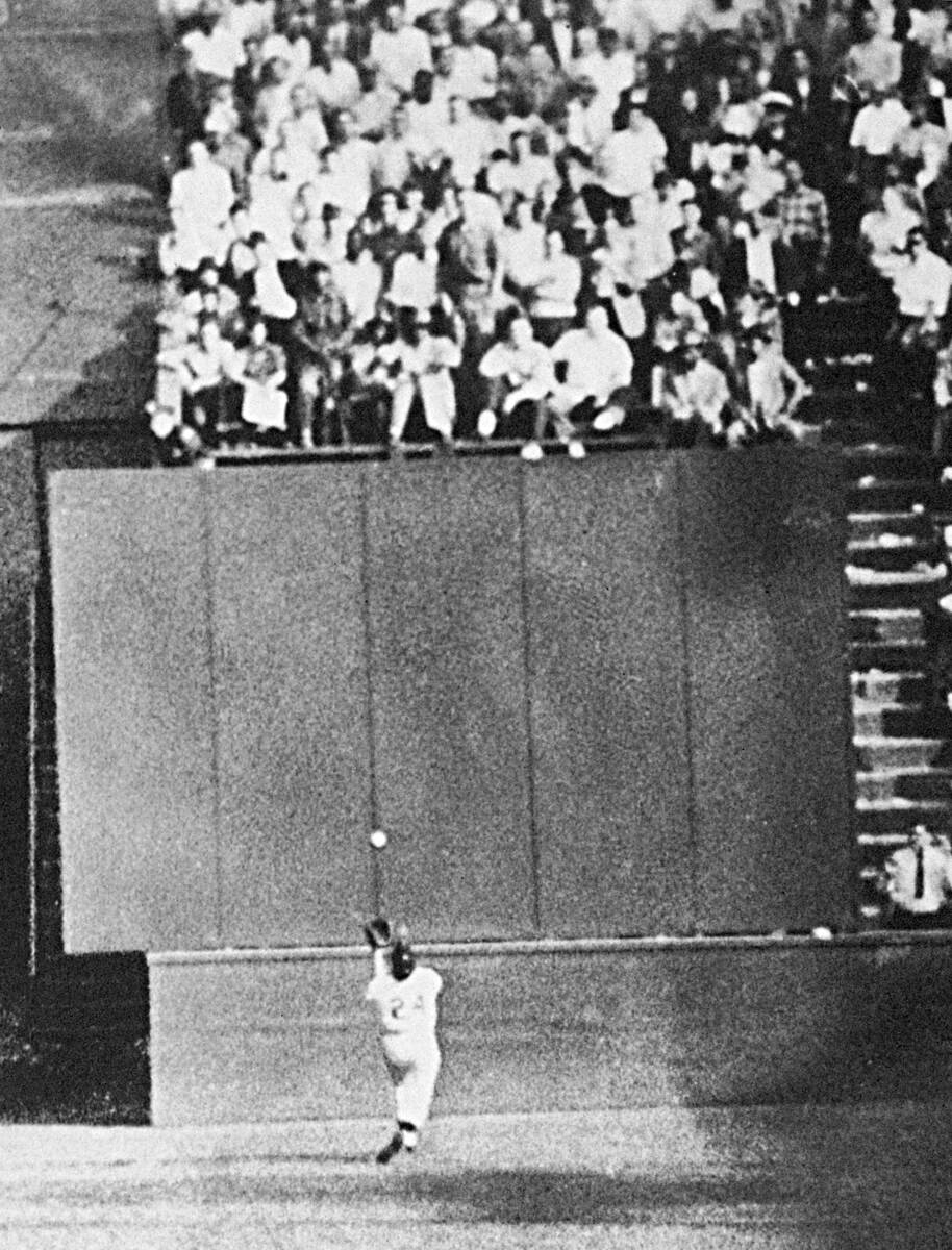 FILE- In this Sept. 29, 1954 file photo, New York Giants center fielder Willie Mays, running at ...