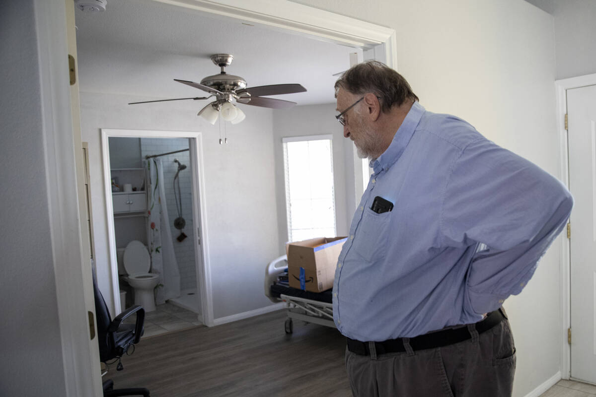 James Belnap looks into a bedroom his wife Marsha would have lived in at his home on Monday, Ju ...