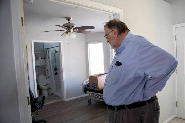 James Belnap looks into a bedroom his wife Marsha would have lived in at his home on Monday, Ju ...