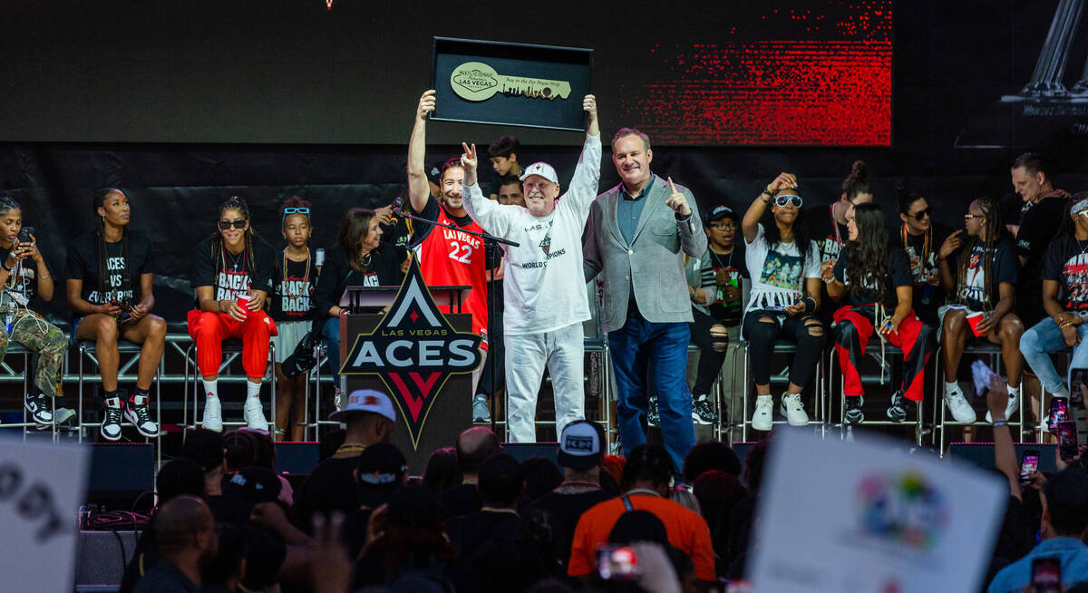 Aces owner Mark Davis receives a key to the city as fans cheer during their championship celebr ...