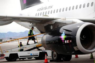 A Volaris Airlines plane sits on the tarmac at Harry Reid International Airport in Las Vegas on ...