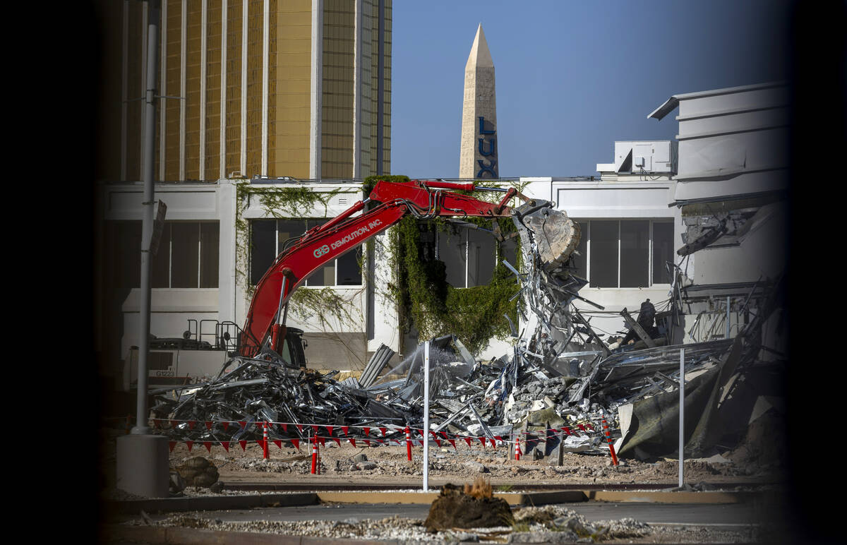 Scrap metal is piled up from the former beach club as demolition continues on the Tropicana in ...