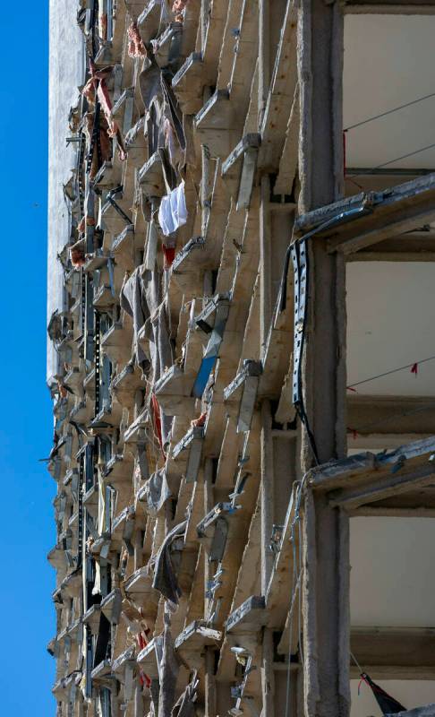 Some debris remains on the stripped floors of the tower as demolition continues on the Tropican ...