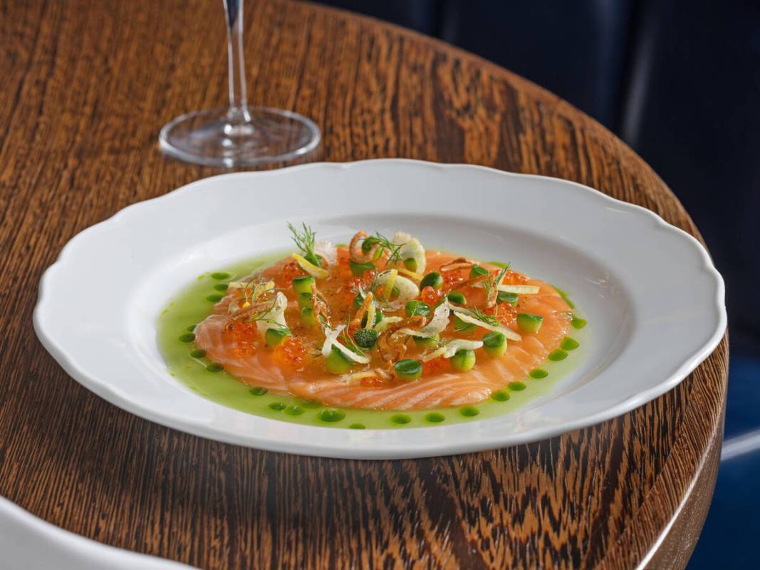 King salmon carpaccio from the seasonal menu launched in late spring 2024 at Aria resort on the ...