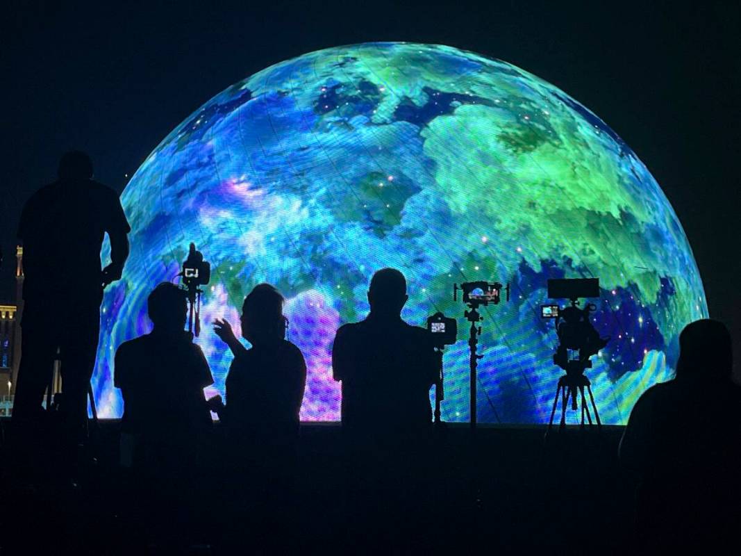 People watch the Sphere July 4th fireworks show on Tuesday, July 4, 2023, in Las Vegas. (James ...