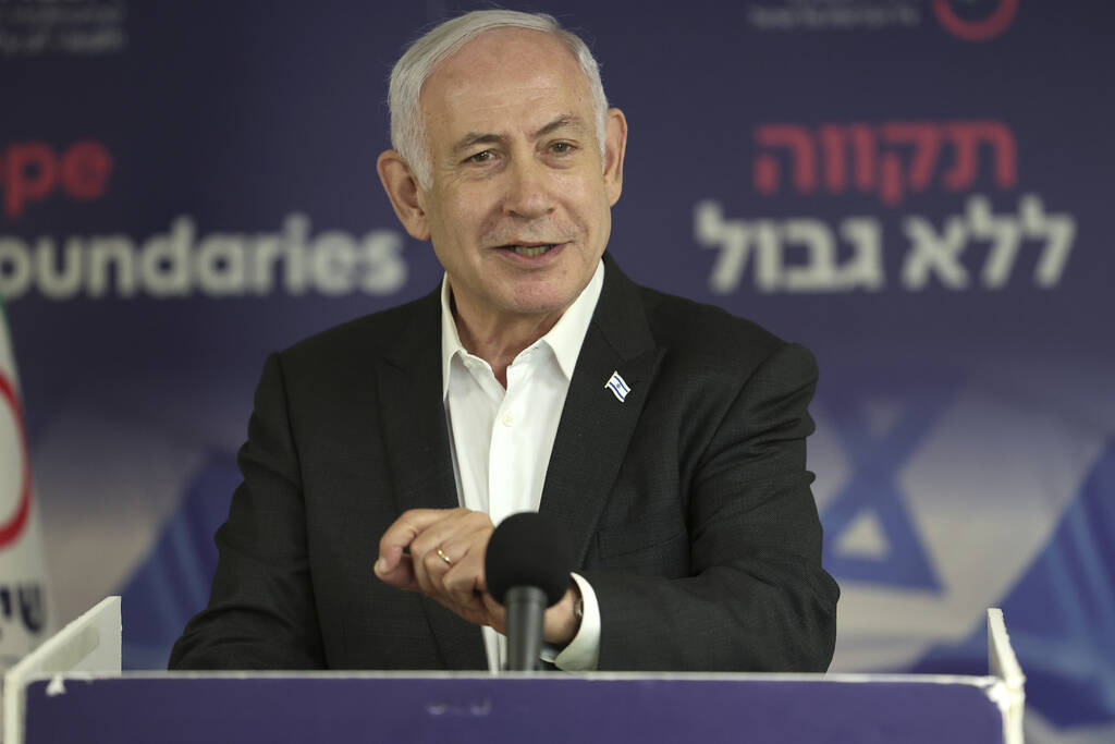 Israeli Prime Minister Benjamin Netanyahu speaks during a news conference at the Sheba Tel HaSh ...