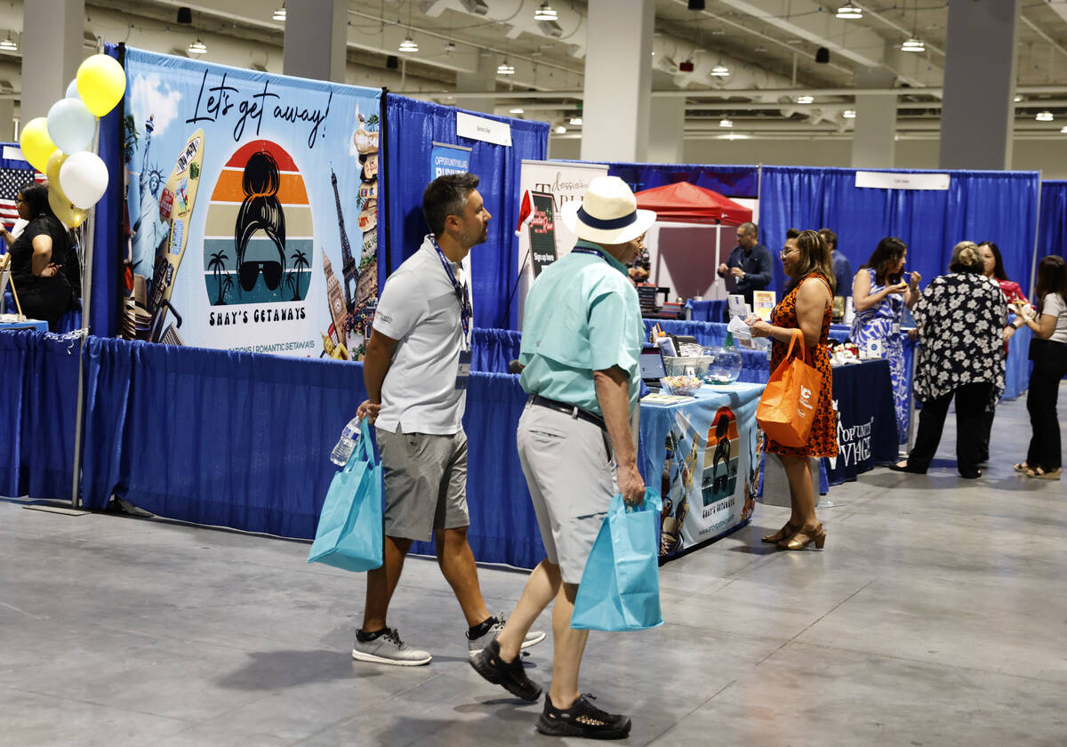 Expogoers check out booths at The Expo at World Market Center during a small business expo, Wed ...