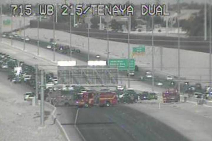 POlice and fire crews work a wrong-way crash on the 215 Beltway near Jones Boulevard that kille ...