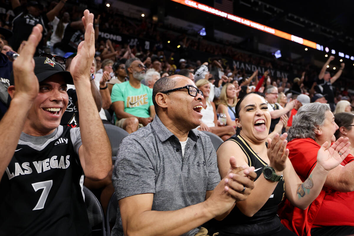 Las Vegas Aces fans cheer during the first half of a WNBA basketball game against the Connectic ...