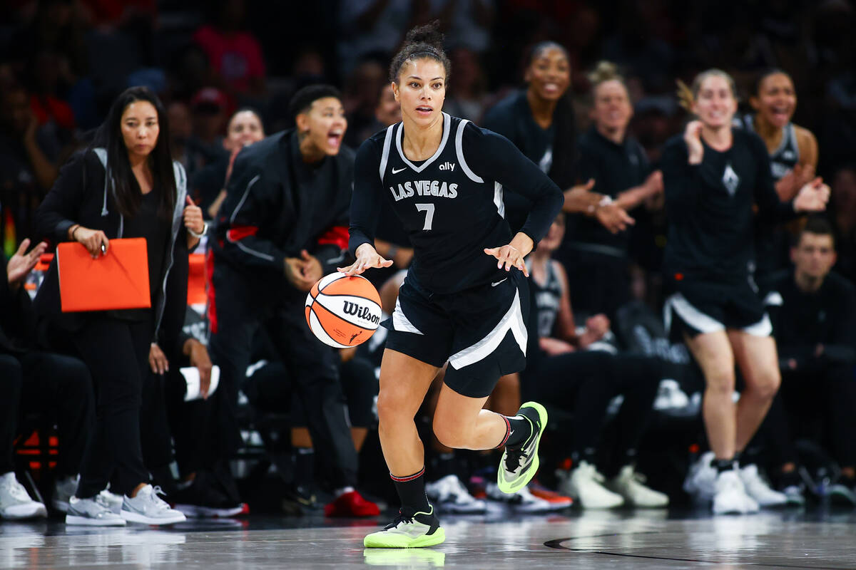 Las Vegas Aces forward Alysha Clark (7) dribbles up the court after stealing the ball from the ...