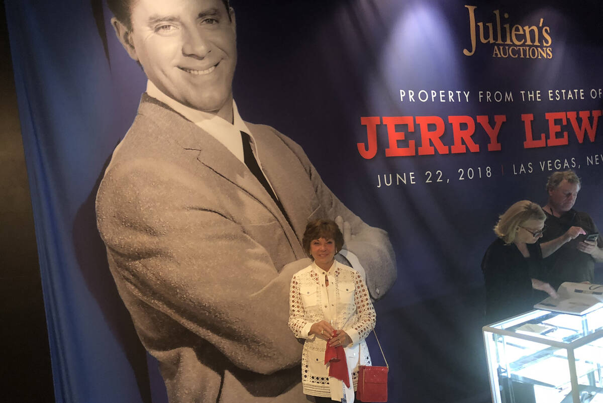 Sam Lewis is shown with an image of her late husband, entertainment legend Jerry Lewis, at Plan ...