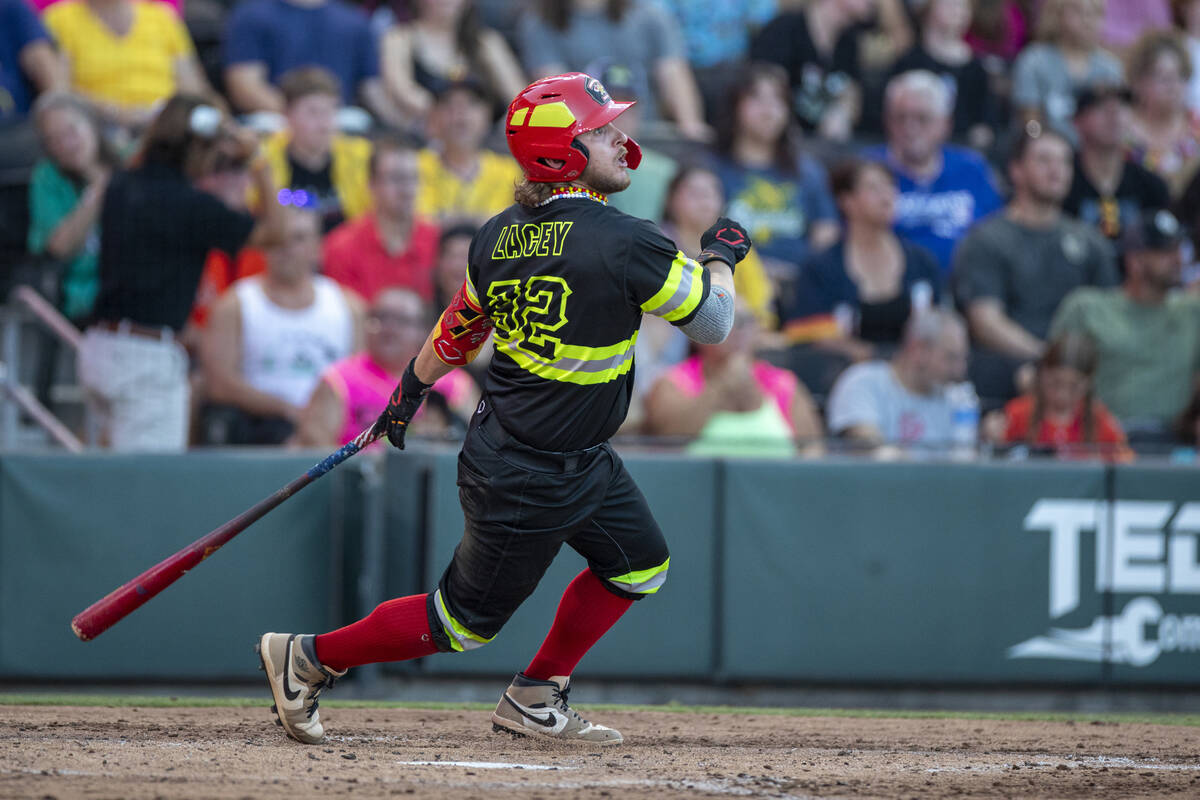 The Firefighters’ Logan Lacey (32) hits the ball during the game against the Party Anima ...
