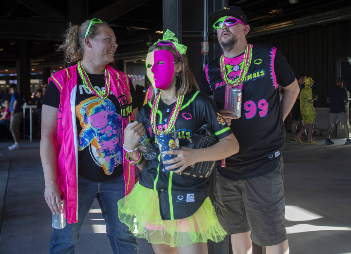 Party Animal fans look for their seats before the game against the Firefighters at Las Vegas Ba ...