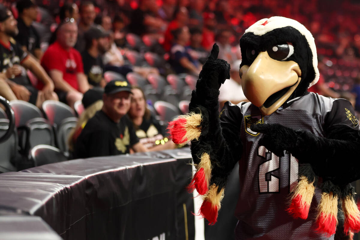 Risk, the Vegas Knight Hawks mascot, interacts with the crowd during an IFL (Indoor Football Le ...