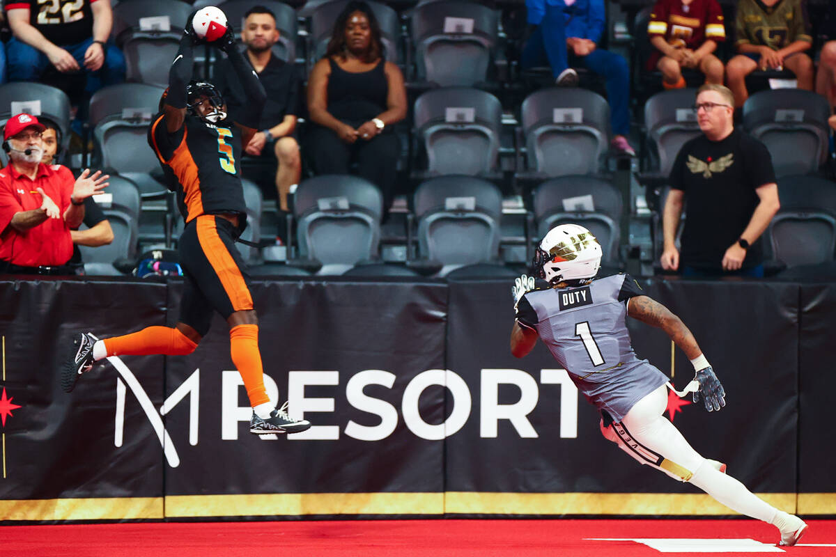 Arizona Rattlers defensive back Jermaine Doubs (5) catches an interception in the end zone that ...