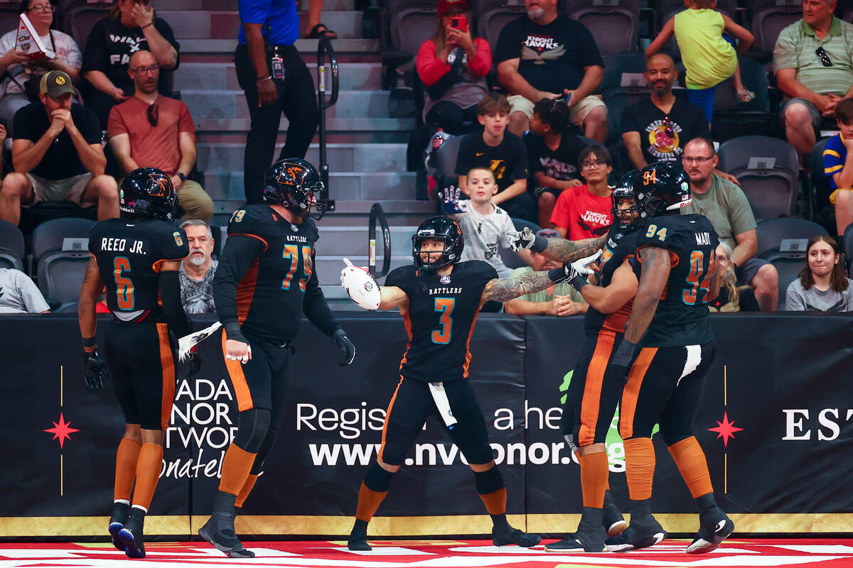 The Arizona Rattlers celebrate a touchdown during an IFL (Indoor Football League) game against ...