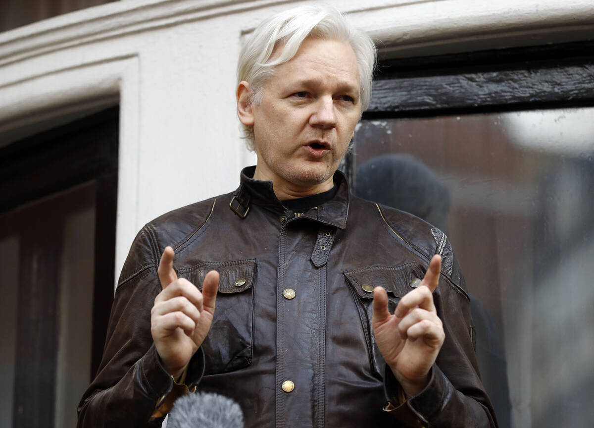 Julian Assange speaks to the media outside the Ecuadorian embassy in London, May 19, 2017. Assa ...