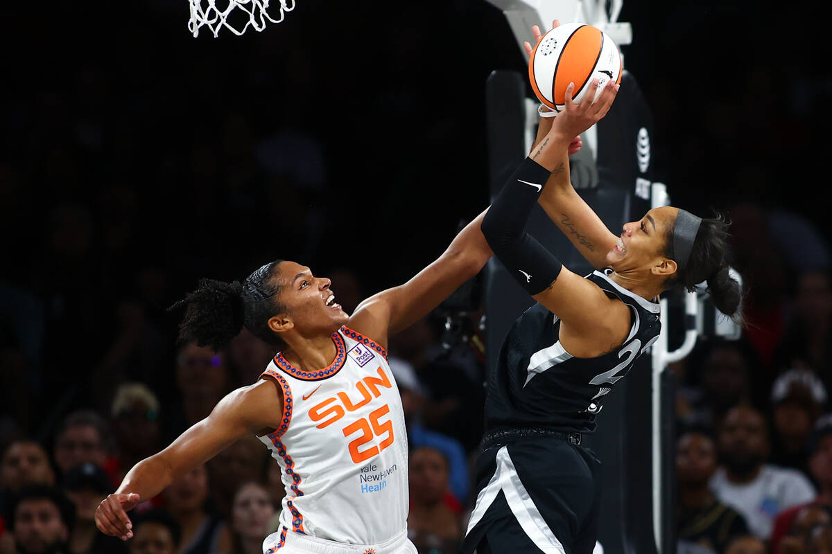 Connecticut Sun forward Alyssa Thomas (25) attempts to block a shot by Las Vegas Aces center A' ...