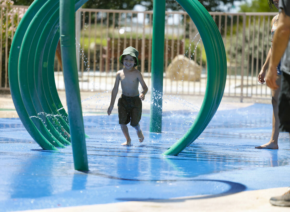 Garrus Williams, 4, plays in the splash pad at Aliante Nature Discovery Park, on Monday, June 2 ...