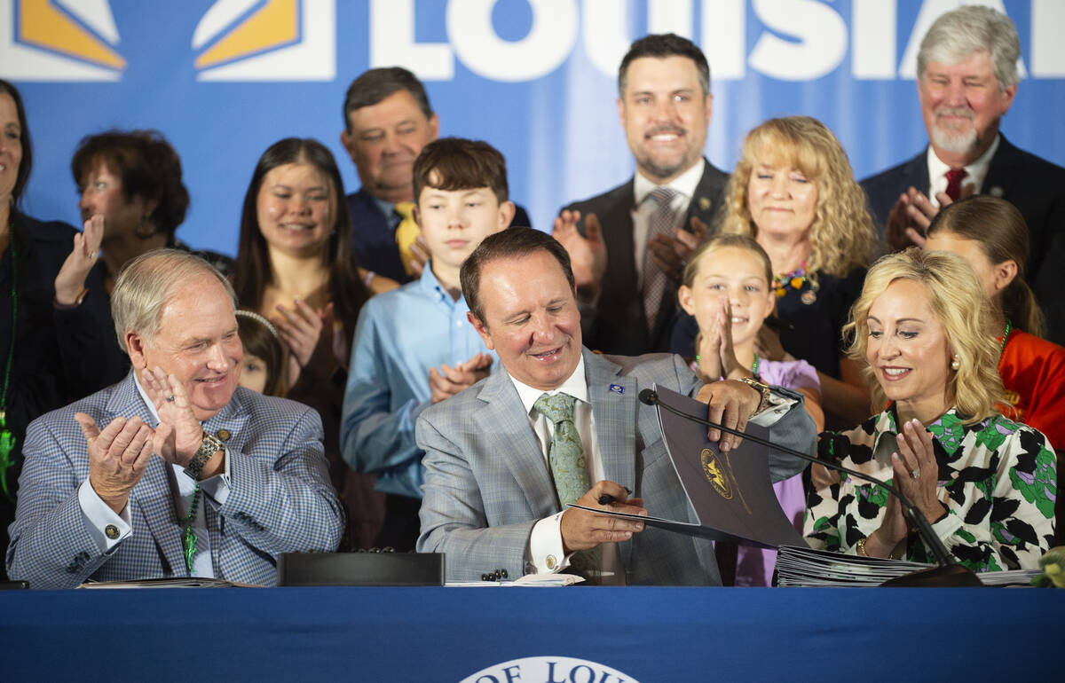 Louisiana Gov. Jeff Landry signs bills related to his education plan, Wednesday, June 19, 2024, ...