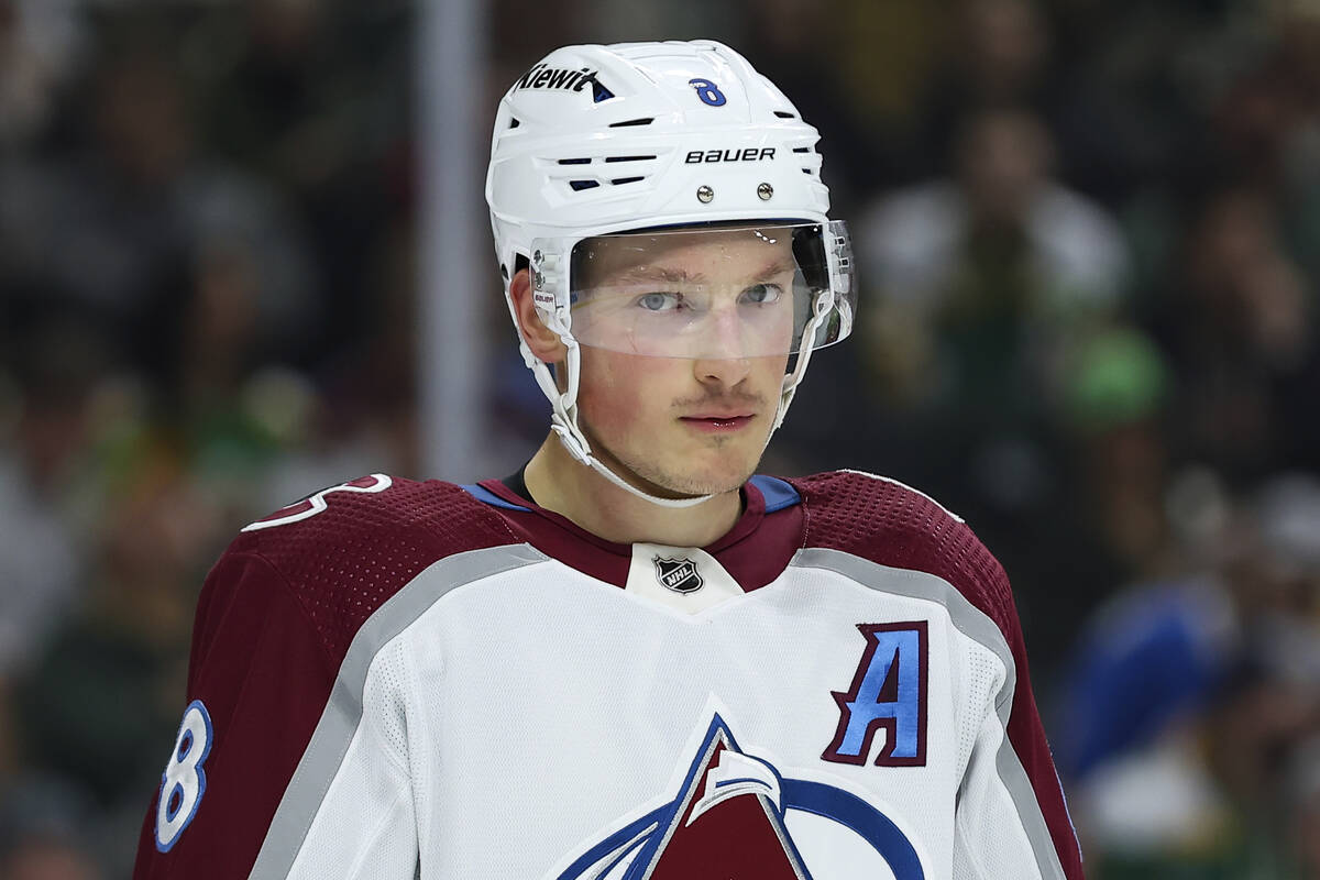 Colorado Avalanche defenseman Cale Makar (8) looks on during the first period of an NHL hockey ...