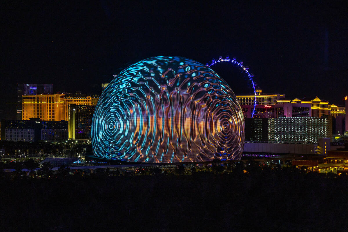 A metallic ball graphic during the opening night of the Sphere with U2 concert on stage Friday, ...